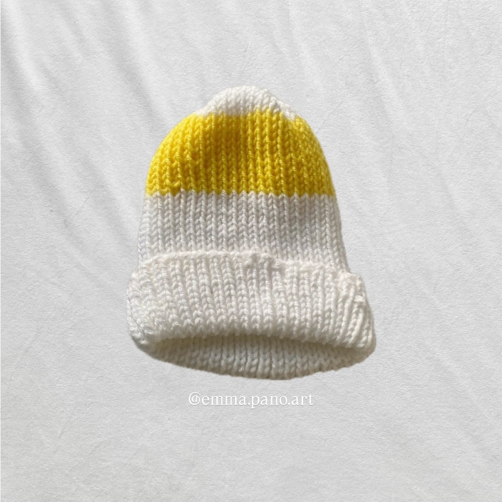 yellow and white hand knit ribbed striped beanie hat